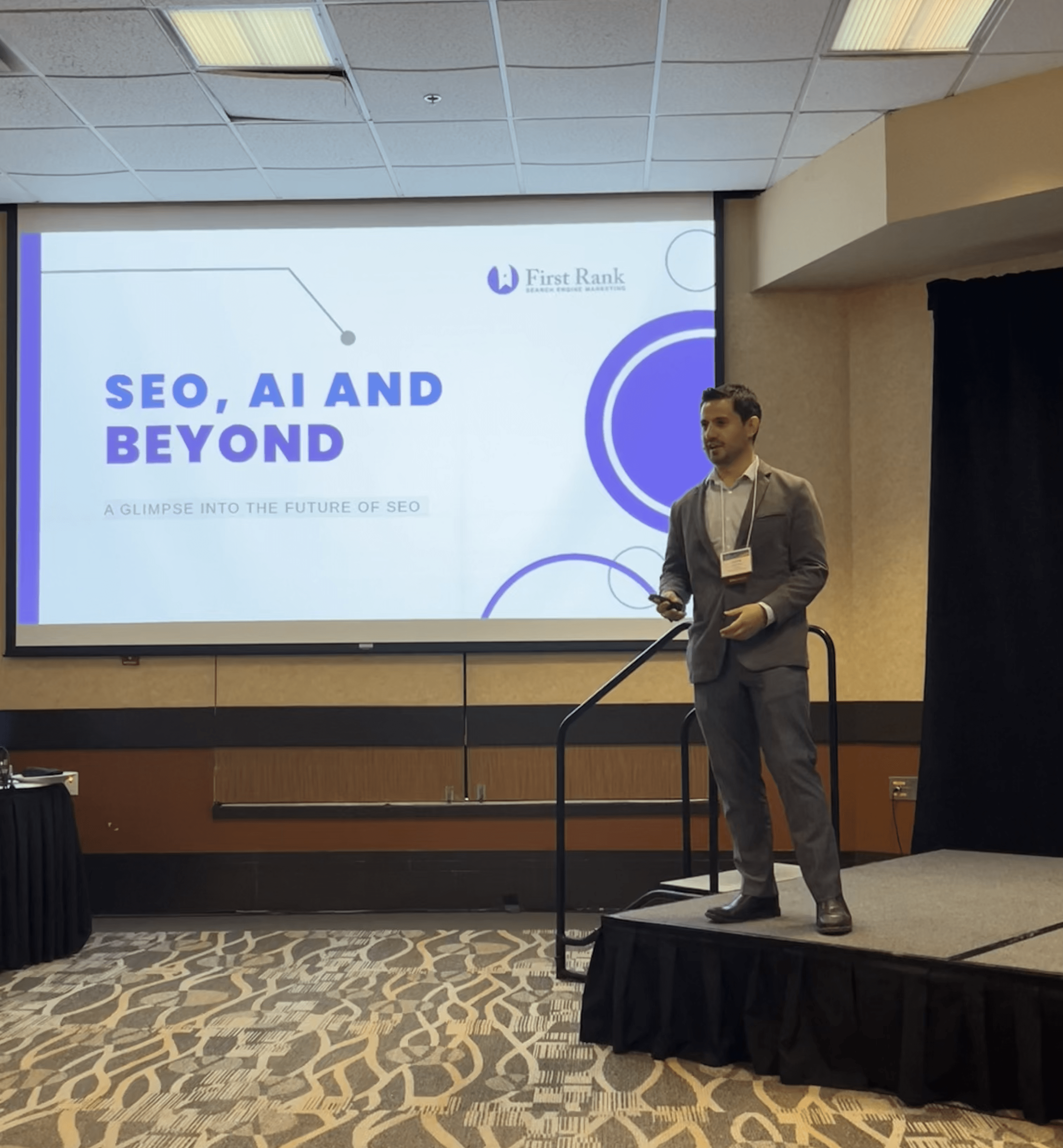 Man standing on stage presenting at digital marketing day in winnipeg